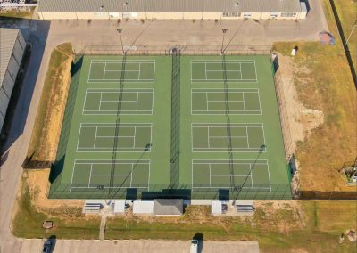 AFTER - Westbrook High School Beaumont ISD (100% 8 Tennis Courts Construction, Resurfacing, Lights system,Galvanized Fence around Tennis Courts & Sidewalk) Entregado Nov 2024