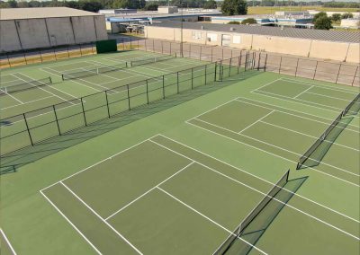 AFTER - Westbrook High School Beaumont ISD (100% 8 Tennis Courts Construction, Resurfacing, Lights system,Galvanized Fence around Tennis Courts & Sidewalk) Entregado Nov 2024