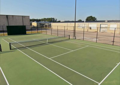 AFTER - Westbrook High School Beaumont ISD (100% 8 Tennis Courts Construction, Resurfacing, Lights system,Galvanized Fence around Tennis Courts & Sidewalk) Entregado Nov 2024